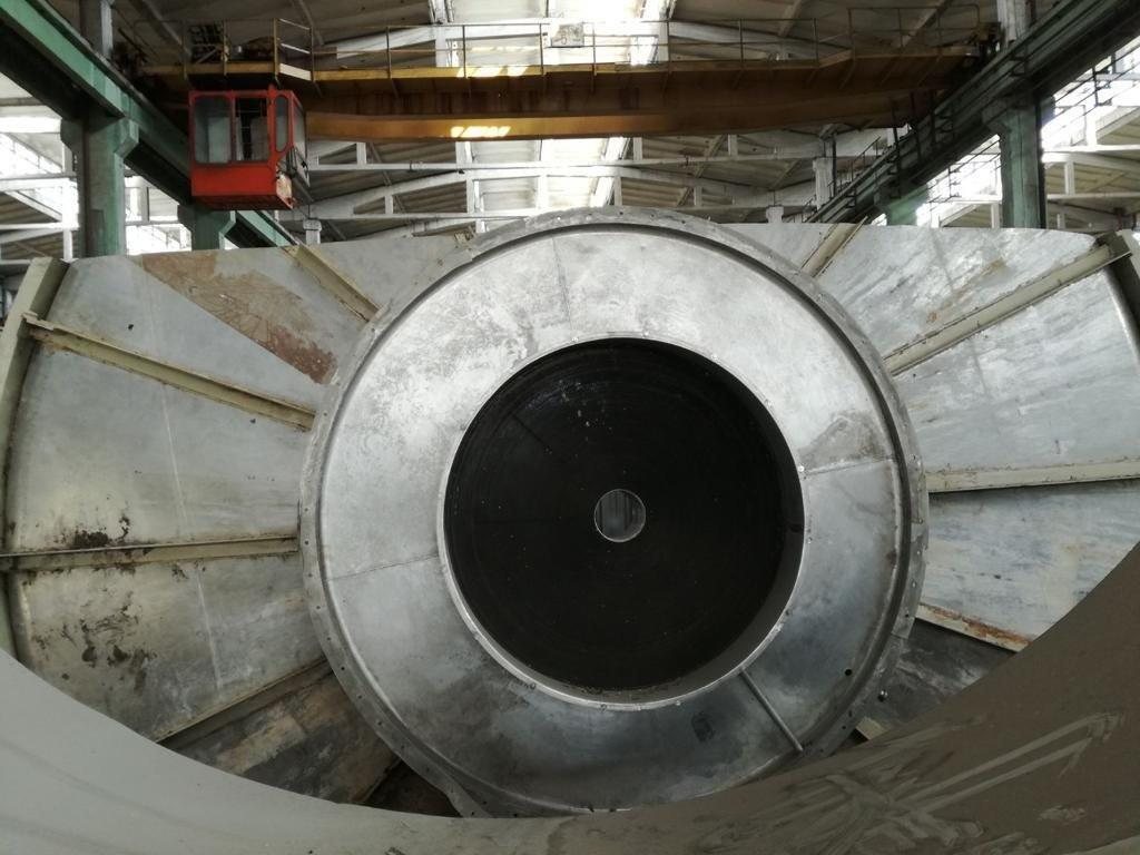 Heavy industrial cargo beneath an indoor crane